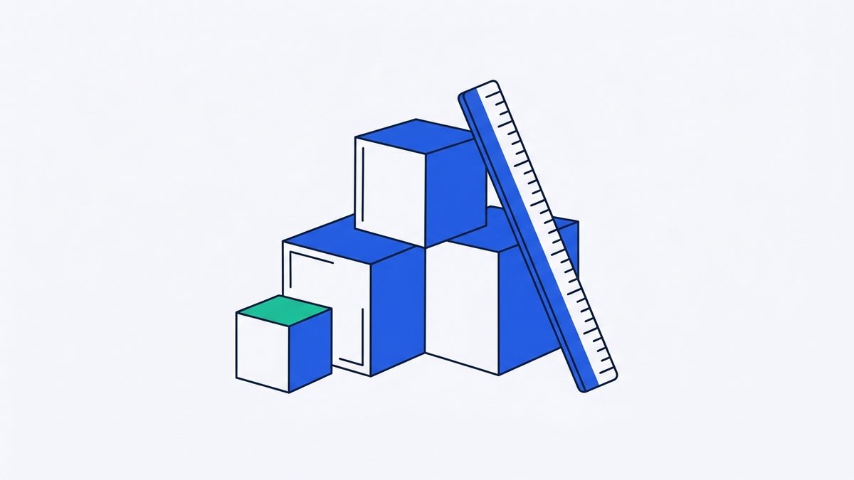 three wooden blocks of different sizes and a ruler